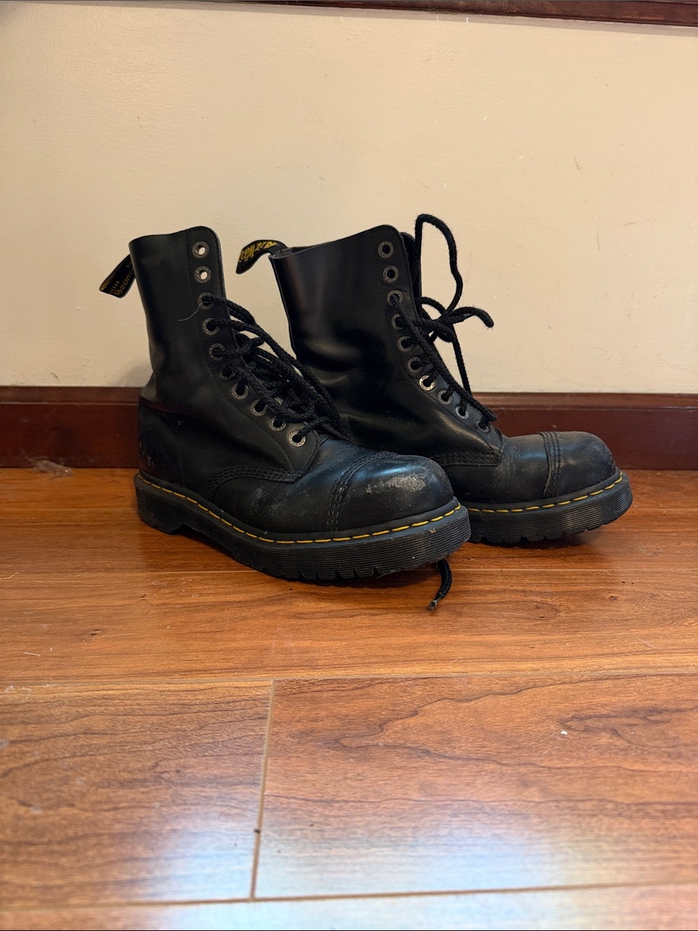 Dr. Martens steel toeBlack Leather 10 Eye Lace-Up Boots with Yellow Welt Stitchi